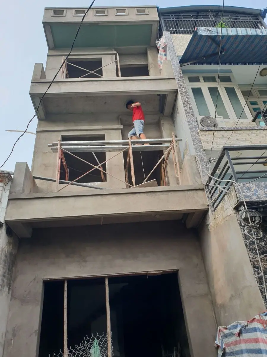 Mặt tiền nh&agrave; phố 3 tầng T&acirc;n Ch&aacute;nh Hiệp Quận 12 sau khi t&ocirc; tr&aacute;t &ndash; X&acirc;y Dựng Kim Anh thi c&ocirc;ng