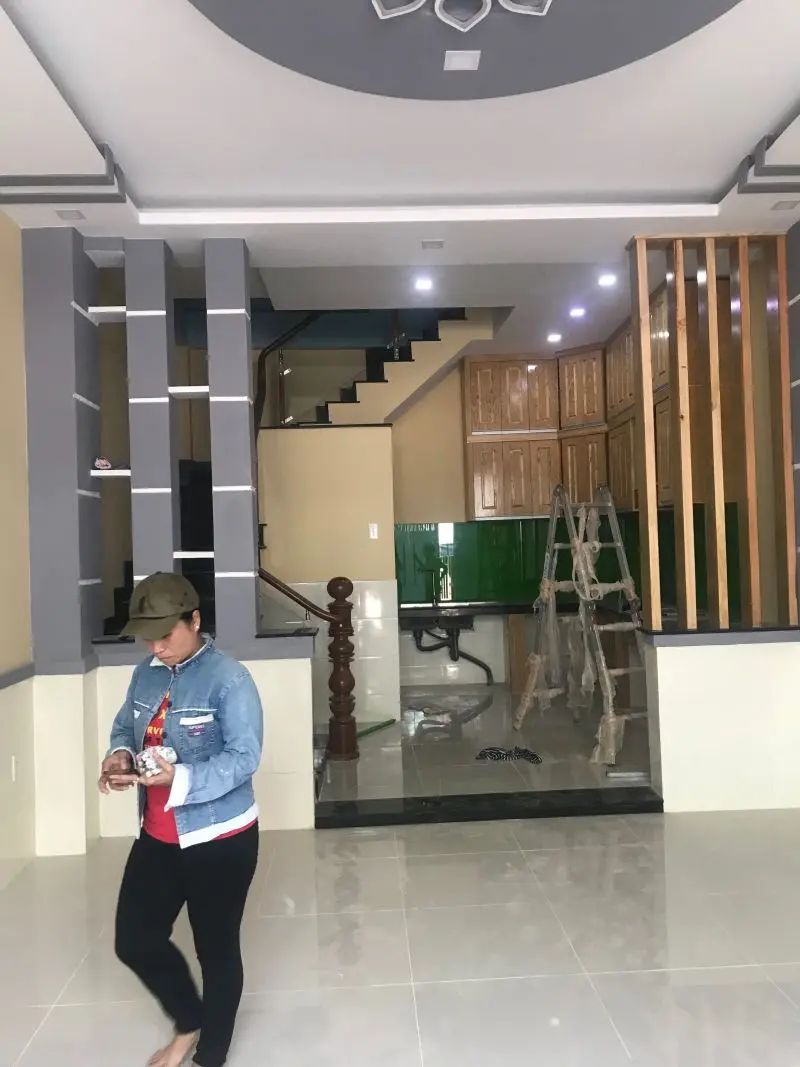 Ph&ograve;ng kh&aacute;ch liền bếp ho&agrave;n thiện nh&agrave; phố trọn g&oacute;i đường Cao Lỗ Quận 8